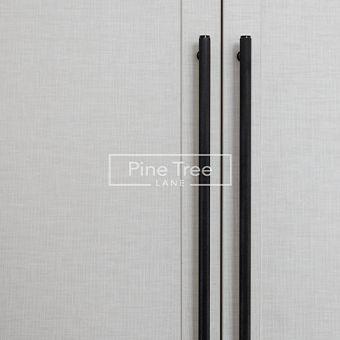 Stylish large handle on contemporary wardrobe design