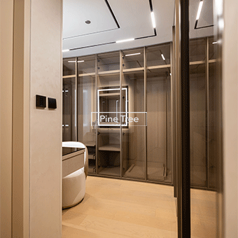 Wardrobe with clear glass panels and slim borders