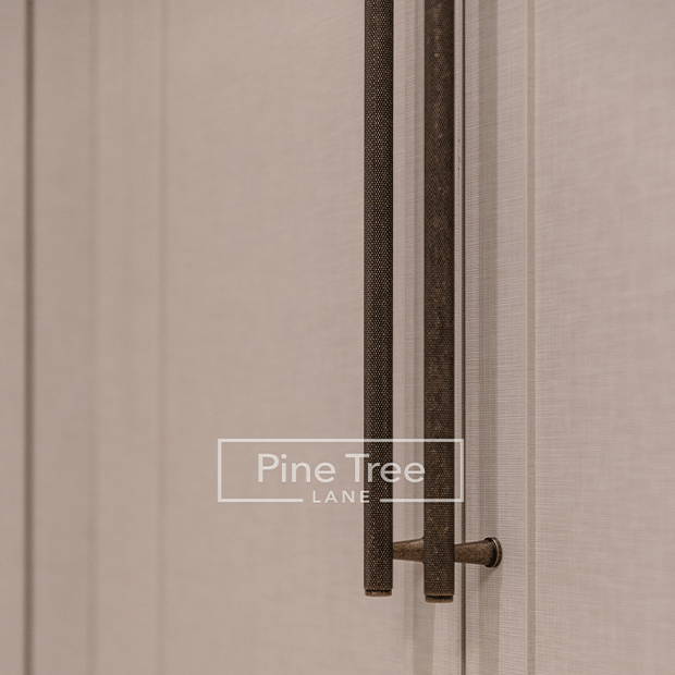 Large handle on a wardrobe cabinet