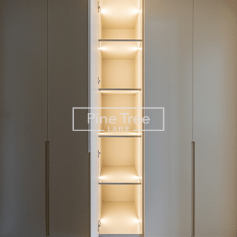 Smart wardrobe cabinet with sensor lighting