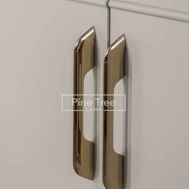 Crafted handle design on a cabinet