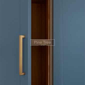 Wardrobe with sensor lighting