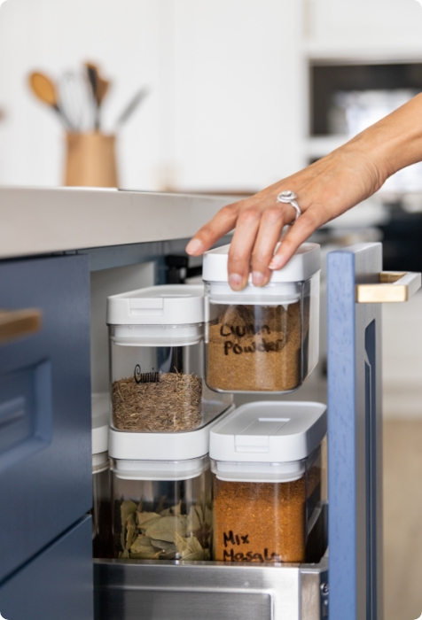modern kitchen accessories in a storage cabinet