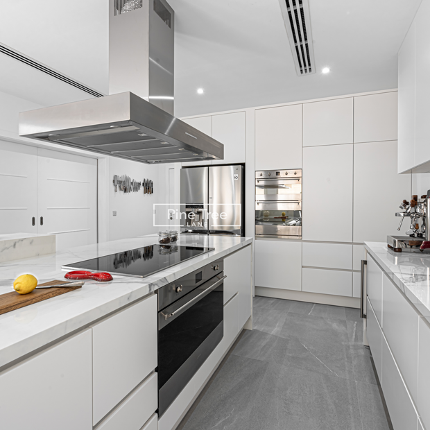 Modular kitchen with marble countertop and modern storage