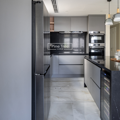 kitchen features gray cabinets