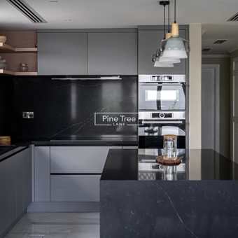 kitchen with matte cabinets and pendant lighting