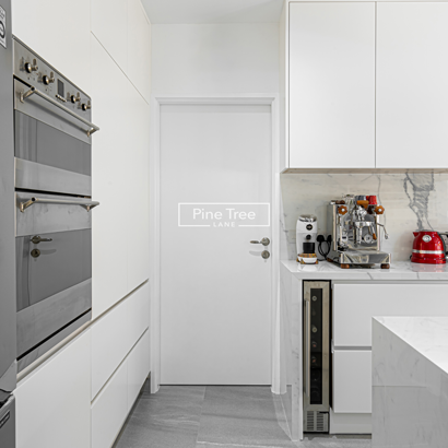 kitchen with fully integrated cabinetry and stainless-steel appliances