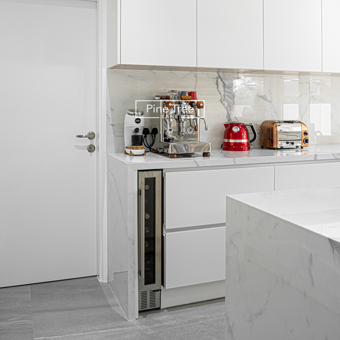 kitchen with marble counters and grey flooring
