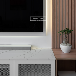 Light wood TV unit with decorative accents and soft lighting