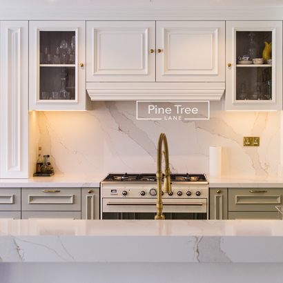 vintage-style brass faucet on a marble countertop