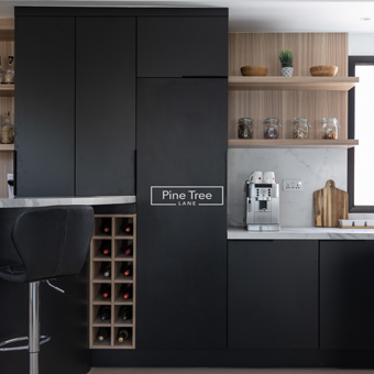 Matte black kitchen with open shelving