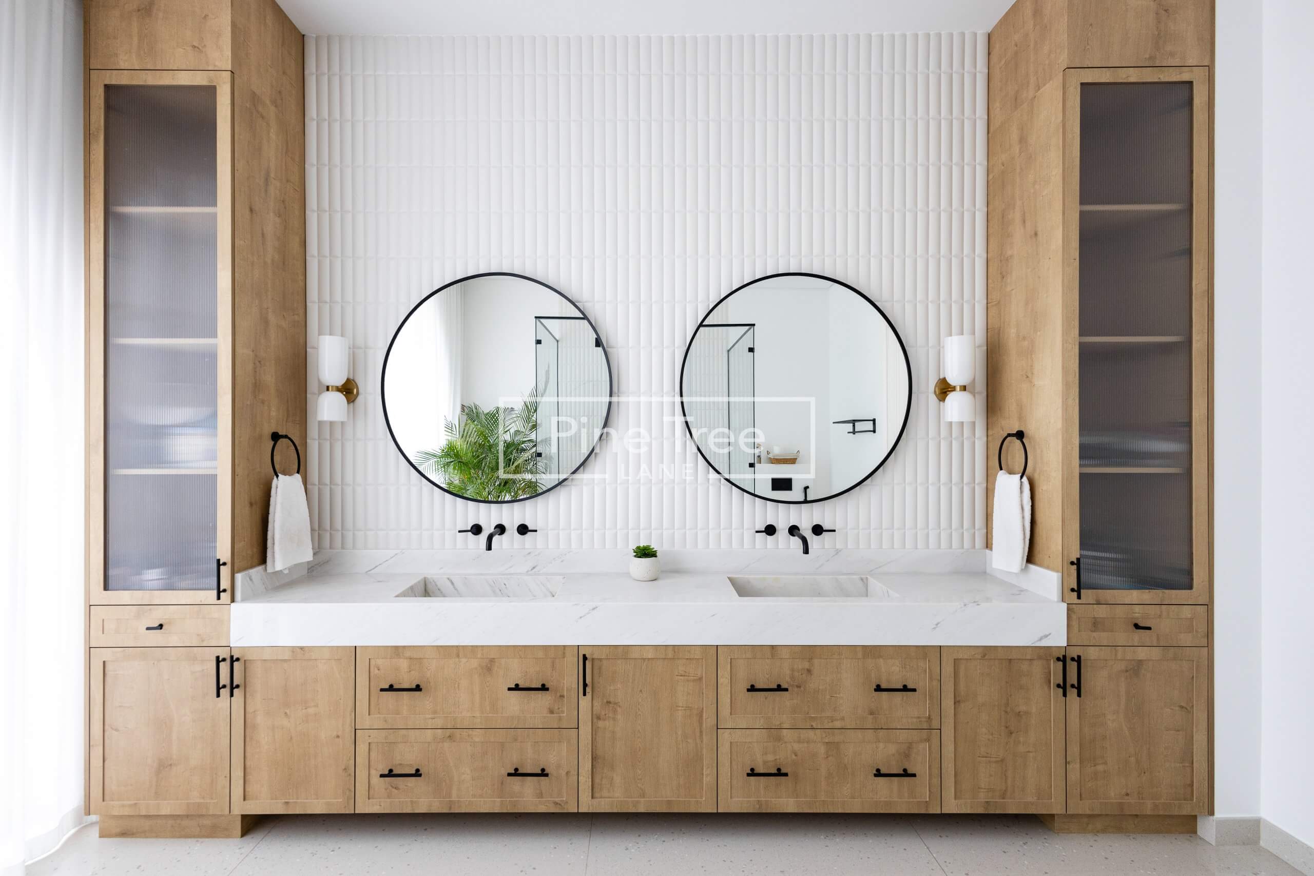 Floating vanity with seamless drawers and two round mirror