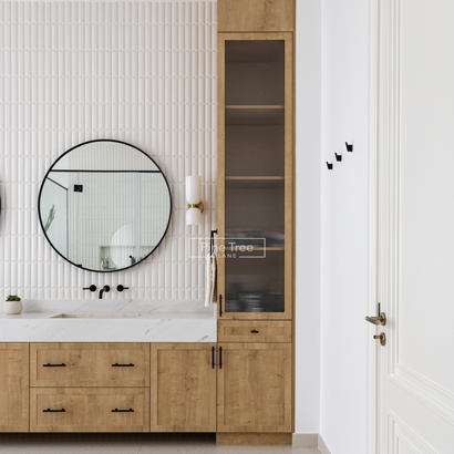 Wall-mounted mirror above oak vanity with black handles