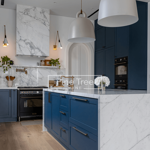 Stylish kitchen with deep blue cabinetry