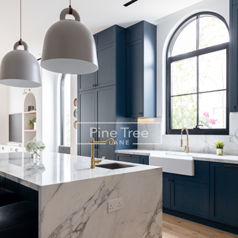 kitchen with navy blue cabinetry
