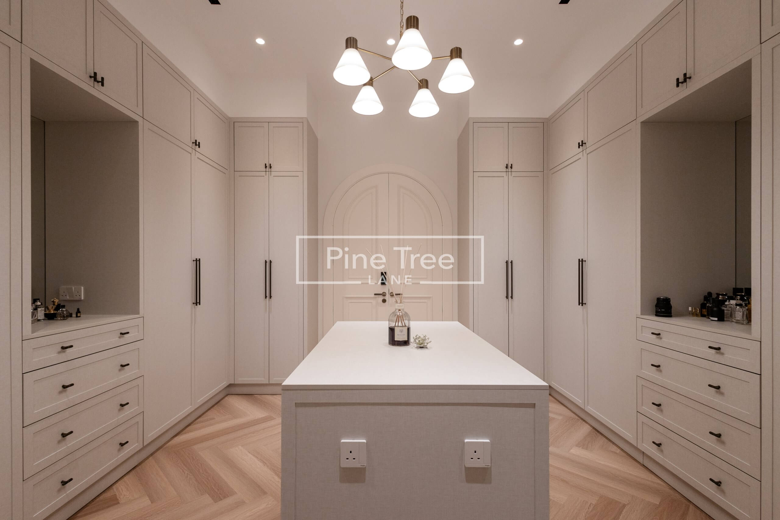 Elegant walk-in wardrobe with central island