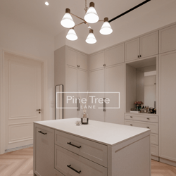 Walk-in wardrobe with shaker cabinets and central island