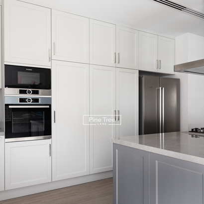 modern kitchen design with wall-to-wall fitted cabinets