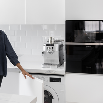 kitchen with subway tiles and built-in ovens