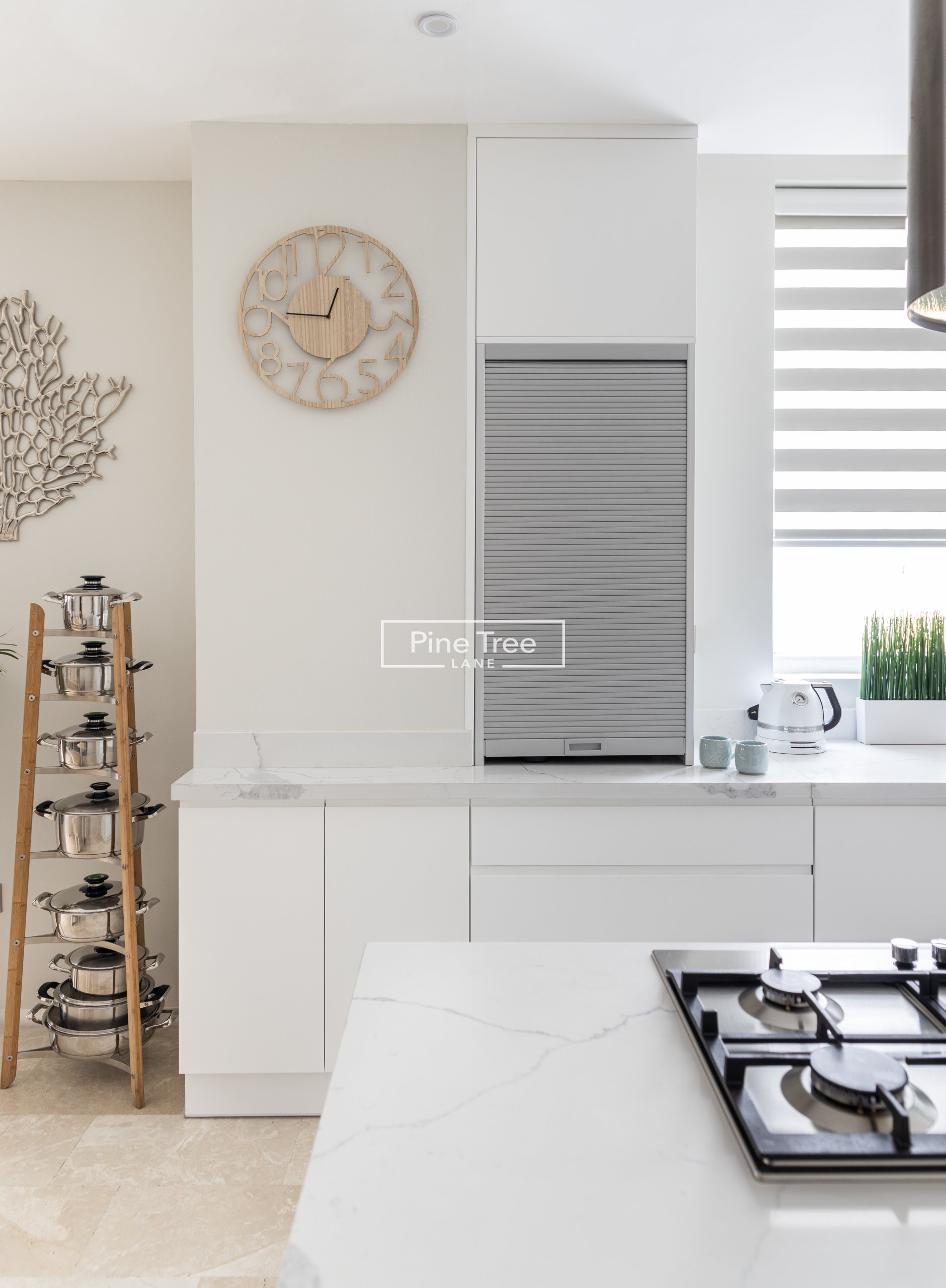 kitchen with white cabinets