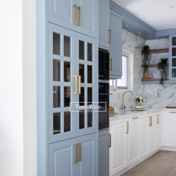 kitchen with blue and white cabinetry