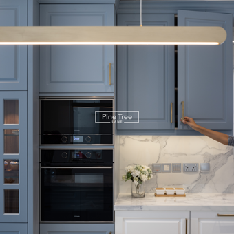 kitchen featuring marble counters and elegant gold finishes