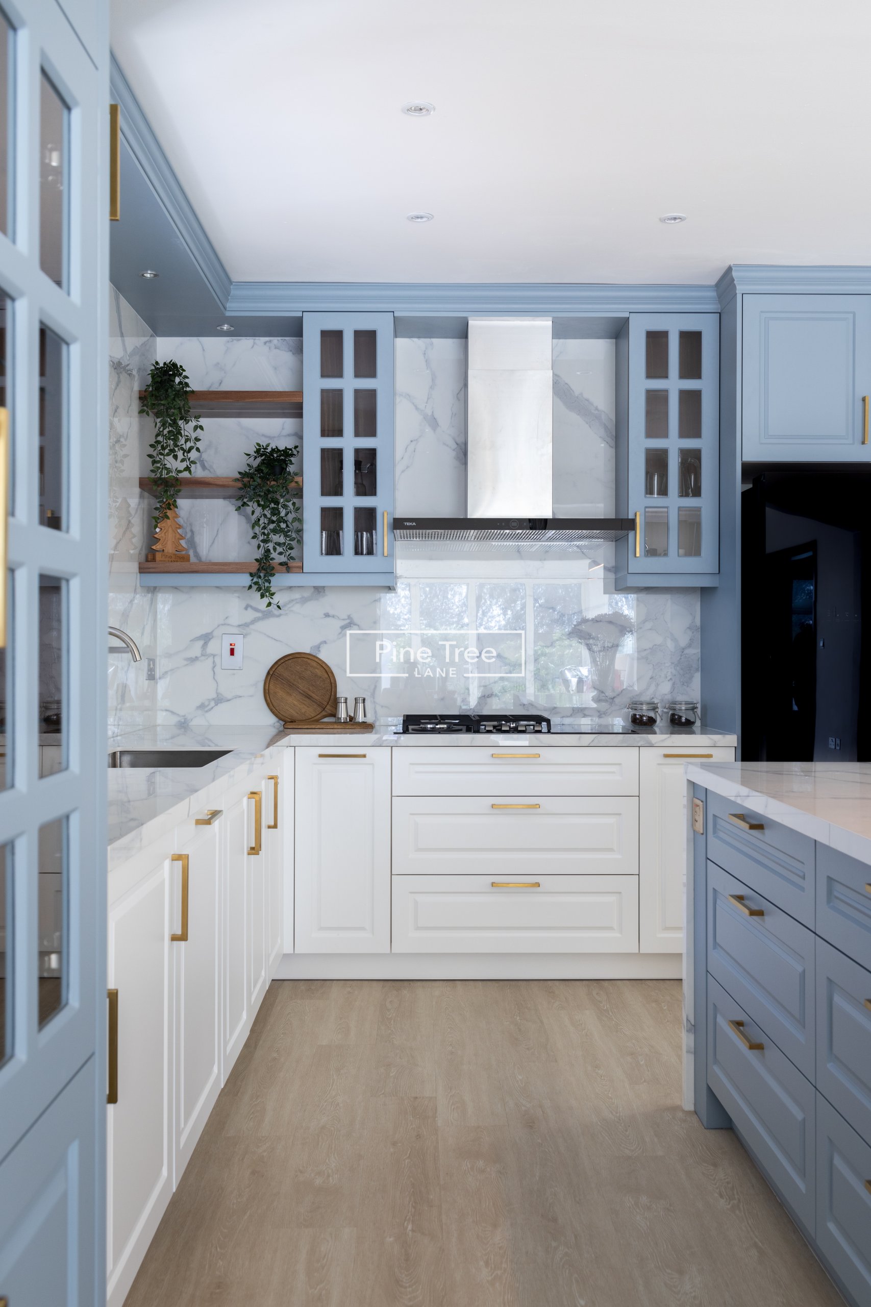 white and blue kitchen cabinetry
