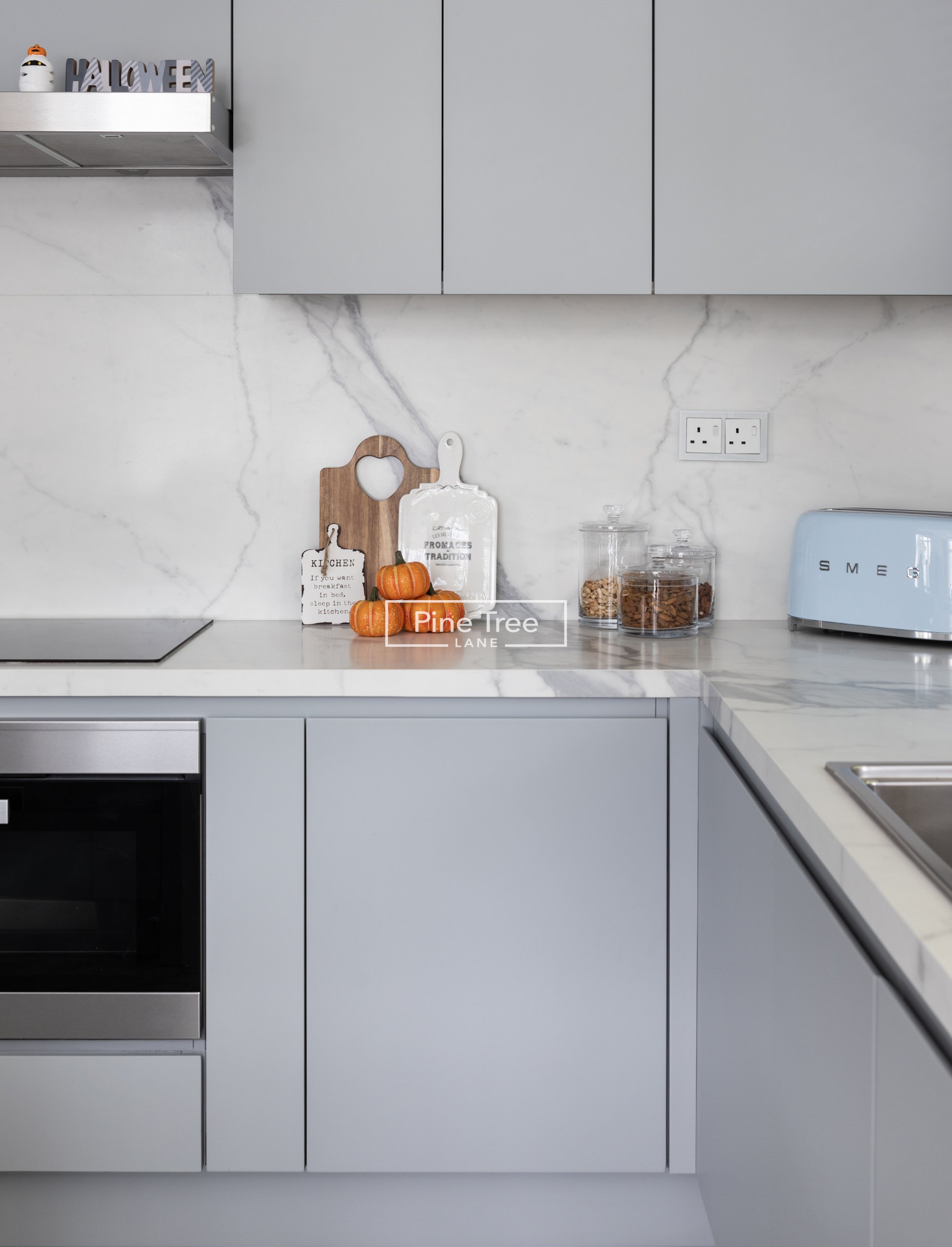modern kitchen with grey cabinetry