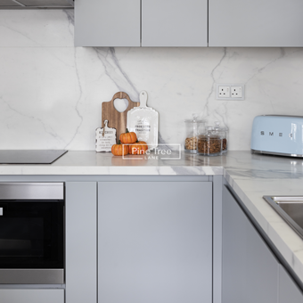 kitchen with integrated appliances and soft finishes