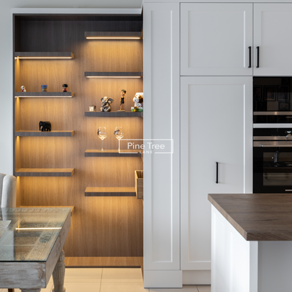 kitchen tower featuring chrome pull-out shelves