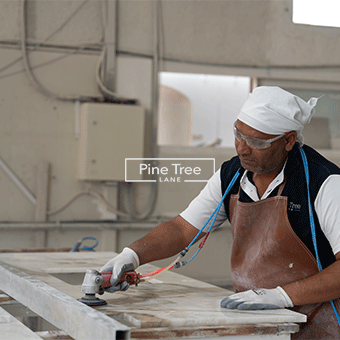 Craftsman working on a piece of marble