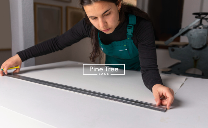 kitchen interior designer measuring a kitchen island space